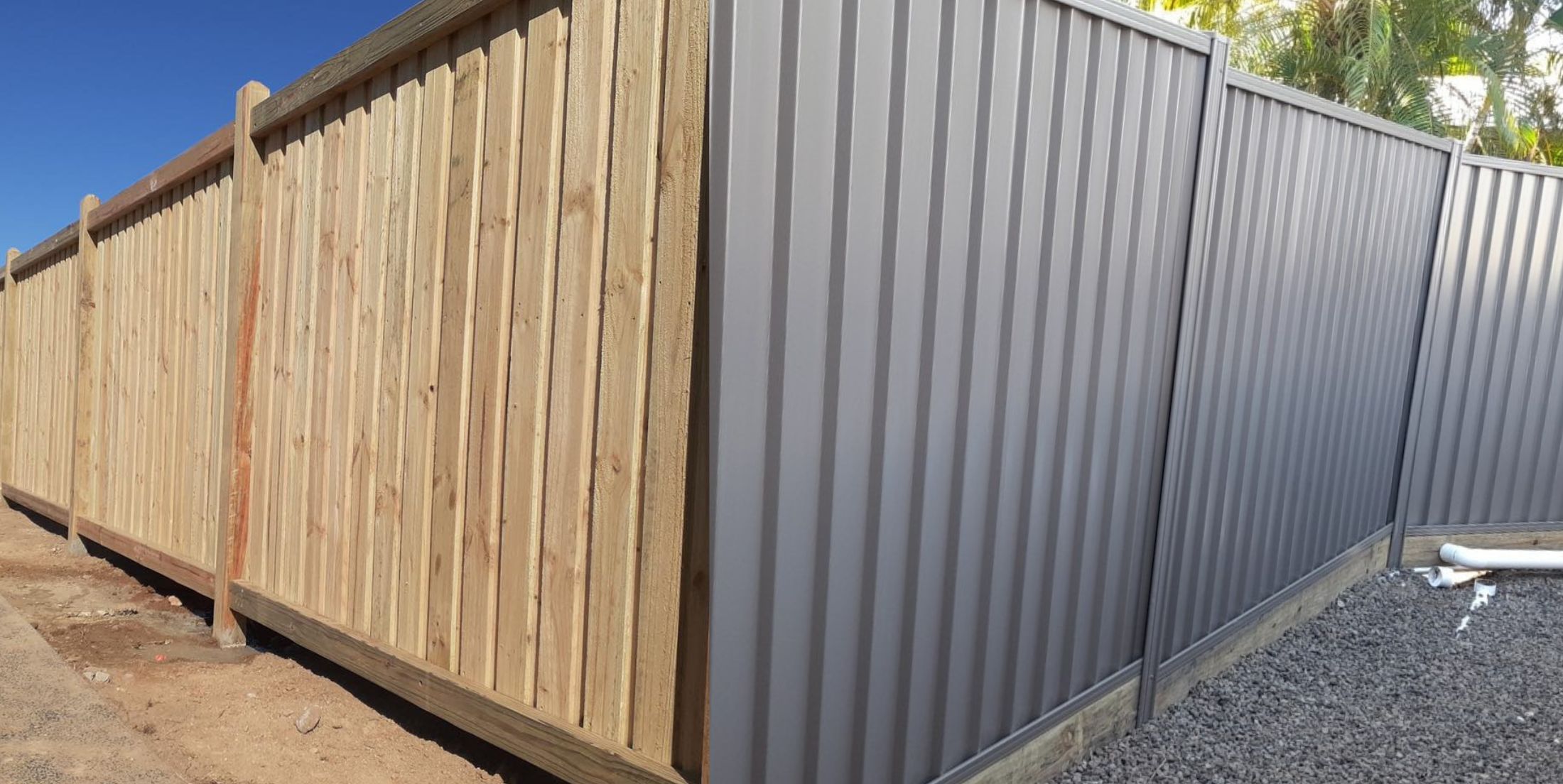 Colorbond versus timber fence Colorbond versus timber fence